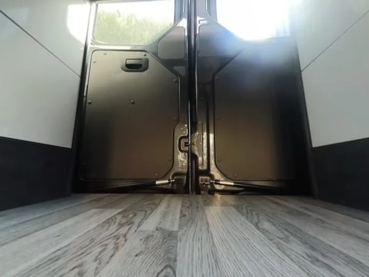 The garage under the bed of a 2017 on VW Crafter LWB, between the bed boxes, to the back doors