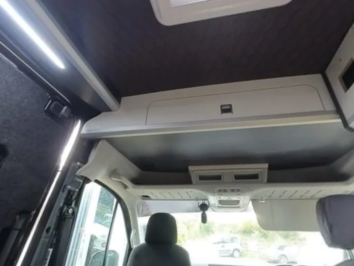 Overhead cab storage above the cab seats of a 2017 on VW Crafter LWB