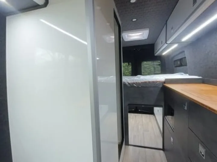 A 1,160 mm shower and toilet cubicle in a 2017 on VW Crafter LWB